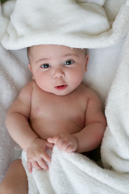 Cute Baby Covered in Towel